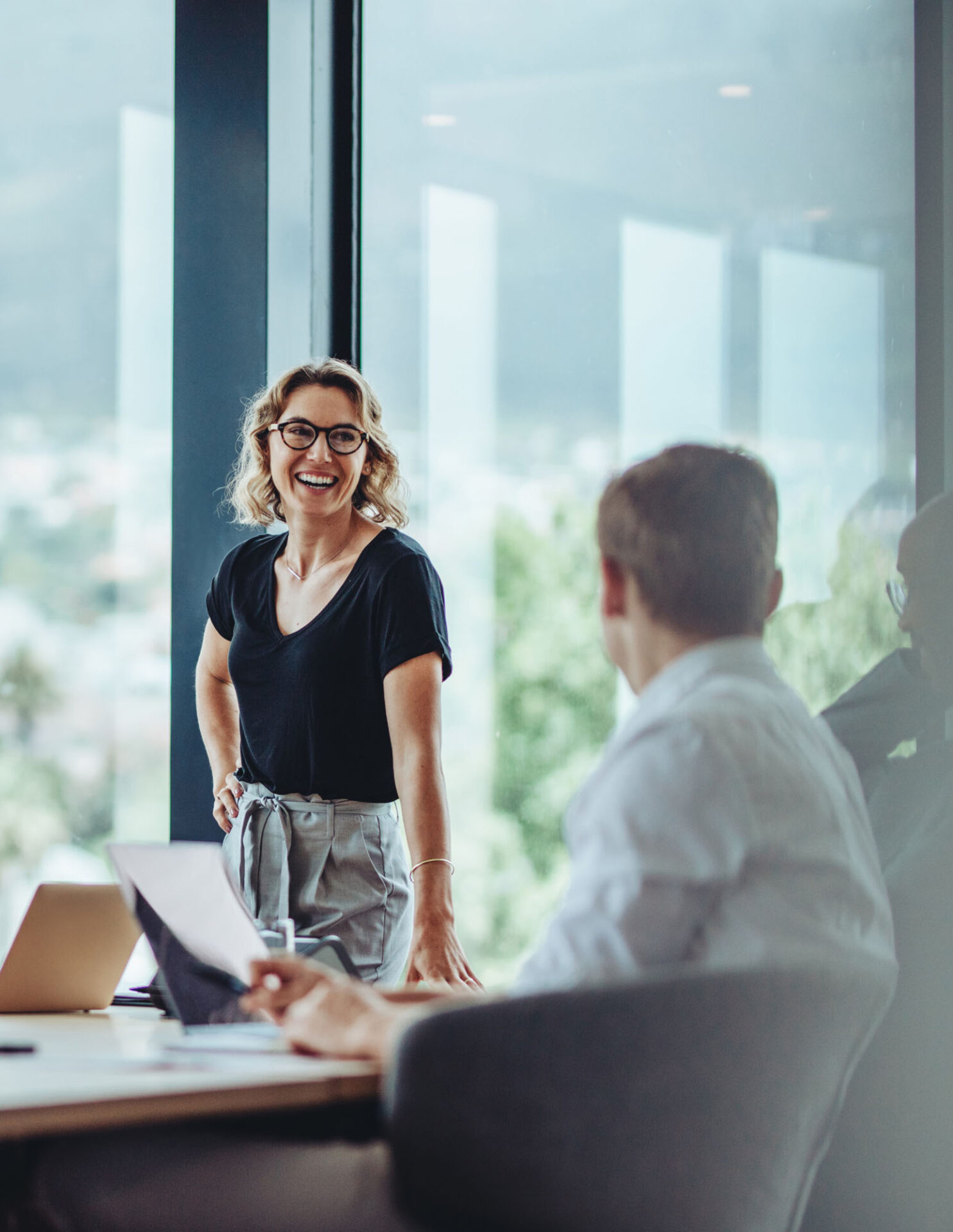 Employees at Colliers having a positive discussion or meeting